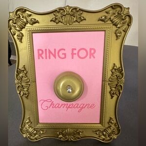 Framed fun doorbell for champagne